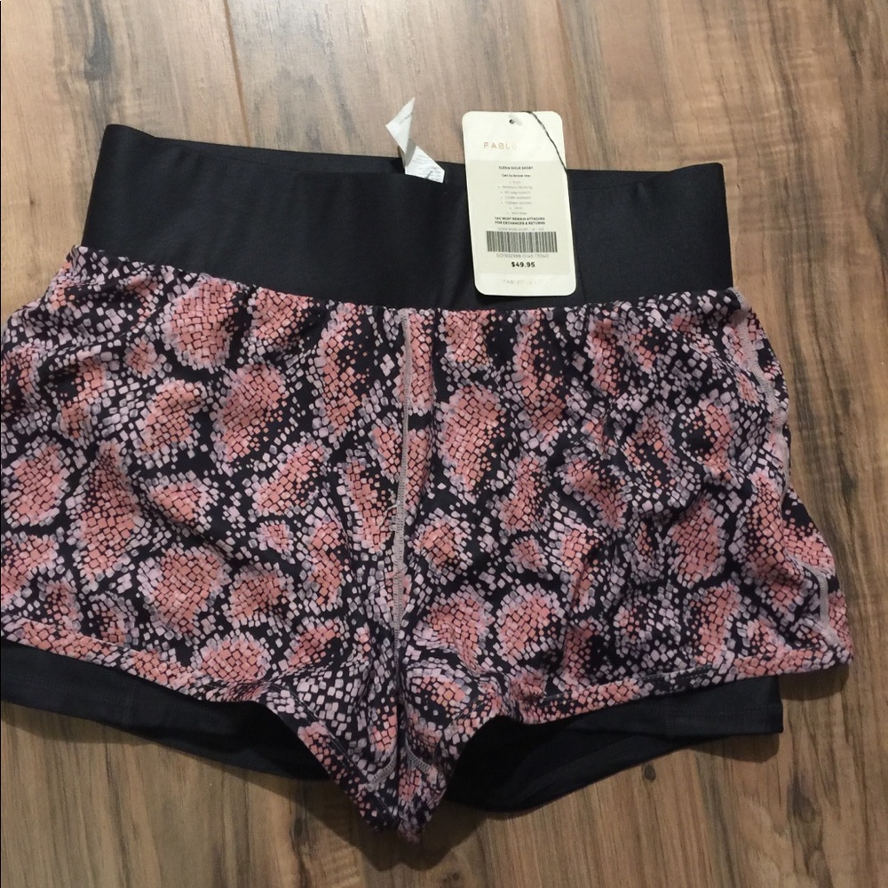 New Fabletics workout shorts, Size M.